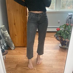 Levi women’s jeans size 28. The jeans are a dark grey wash